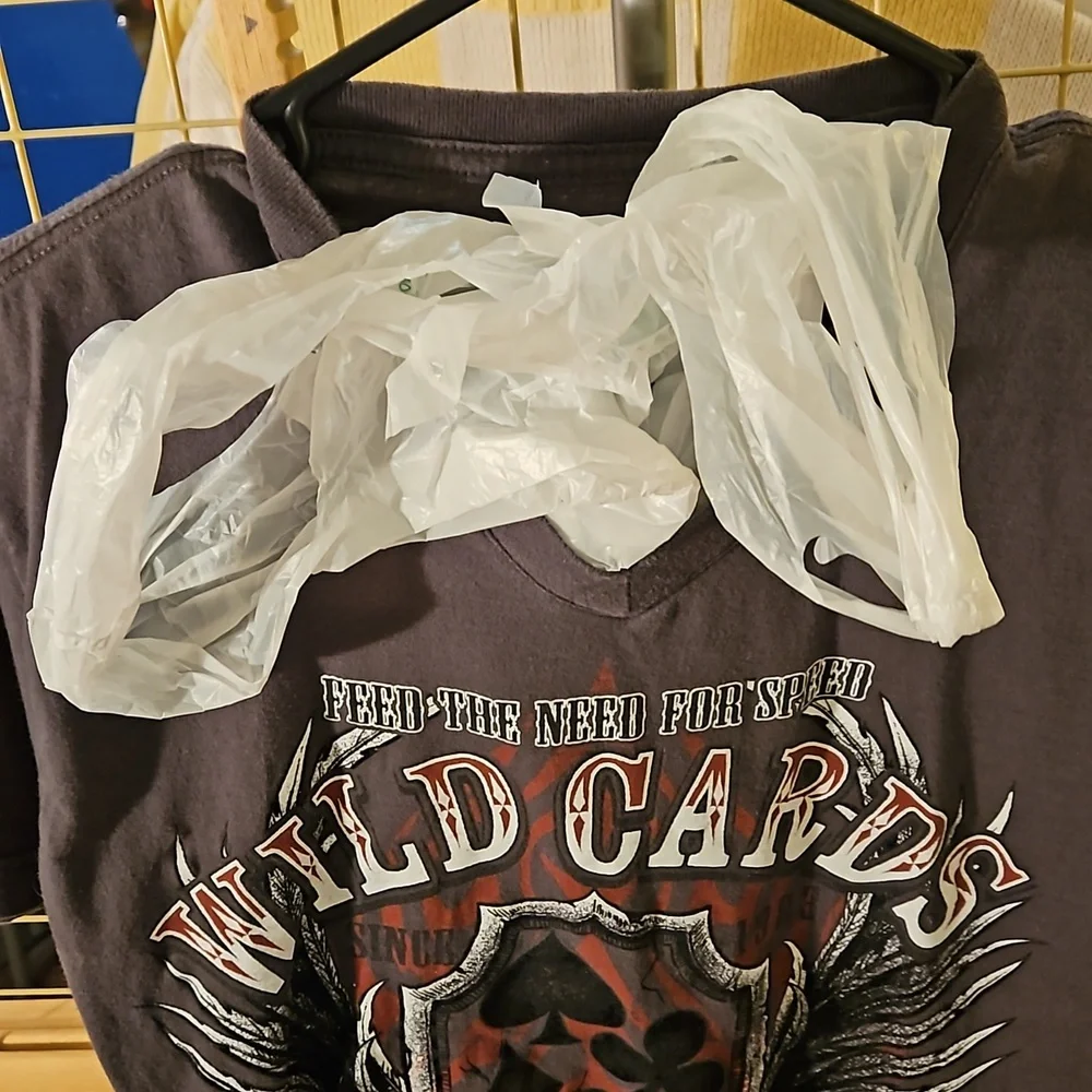 From moms closet This is a shirt sewed up to store plastic bags or anything else